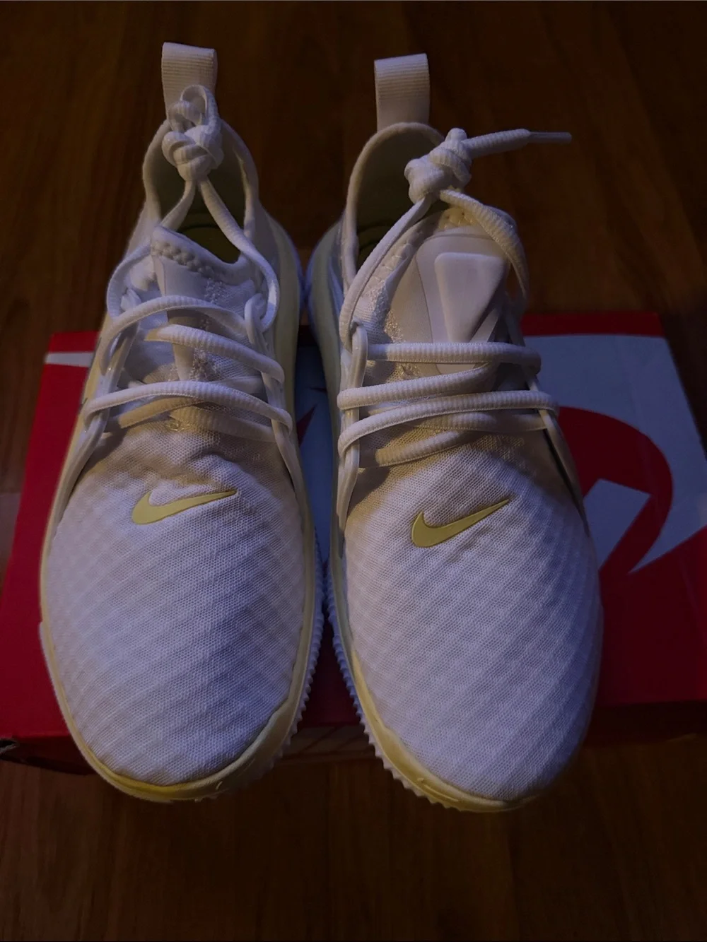 Nike White Athletic Sneakers with Blue Swoosh and Cream Trim
